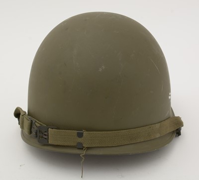 Lot 826 - A US M1 combat helmet