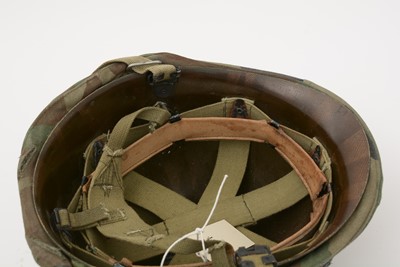 Lot 827 - A US M1 combat helmet
