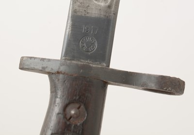 Lot 787 - An American bayonet and another.