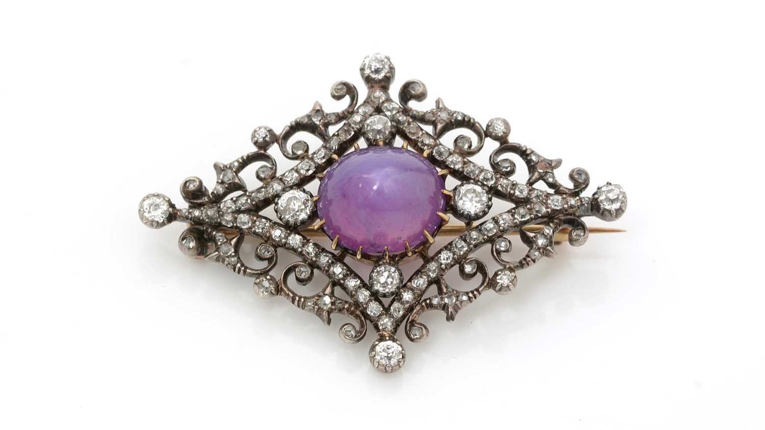 Lot 483 - A Victorian star ruby and diamond brooch, retailed by Wartski