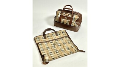 Lot 614 - A vintage Burberry Sports holdall and a garment bag