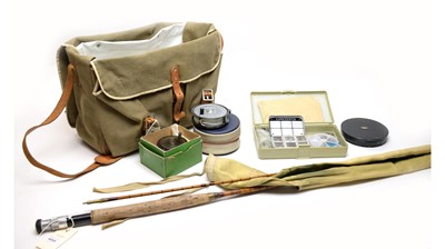 Lot 408 - A selection of fishing rods, reels and other fishing ephemera.