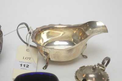 Lot 112 - A silver sauce boat by Viners, and other items.