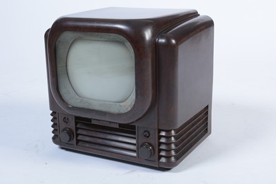 Lot 40 - Bush bakelite TV, demodulator and VHS player.