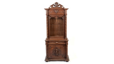 Lot 1105 - A late 19th Century North European carved oak breakfront cabinet on stand