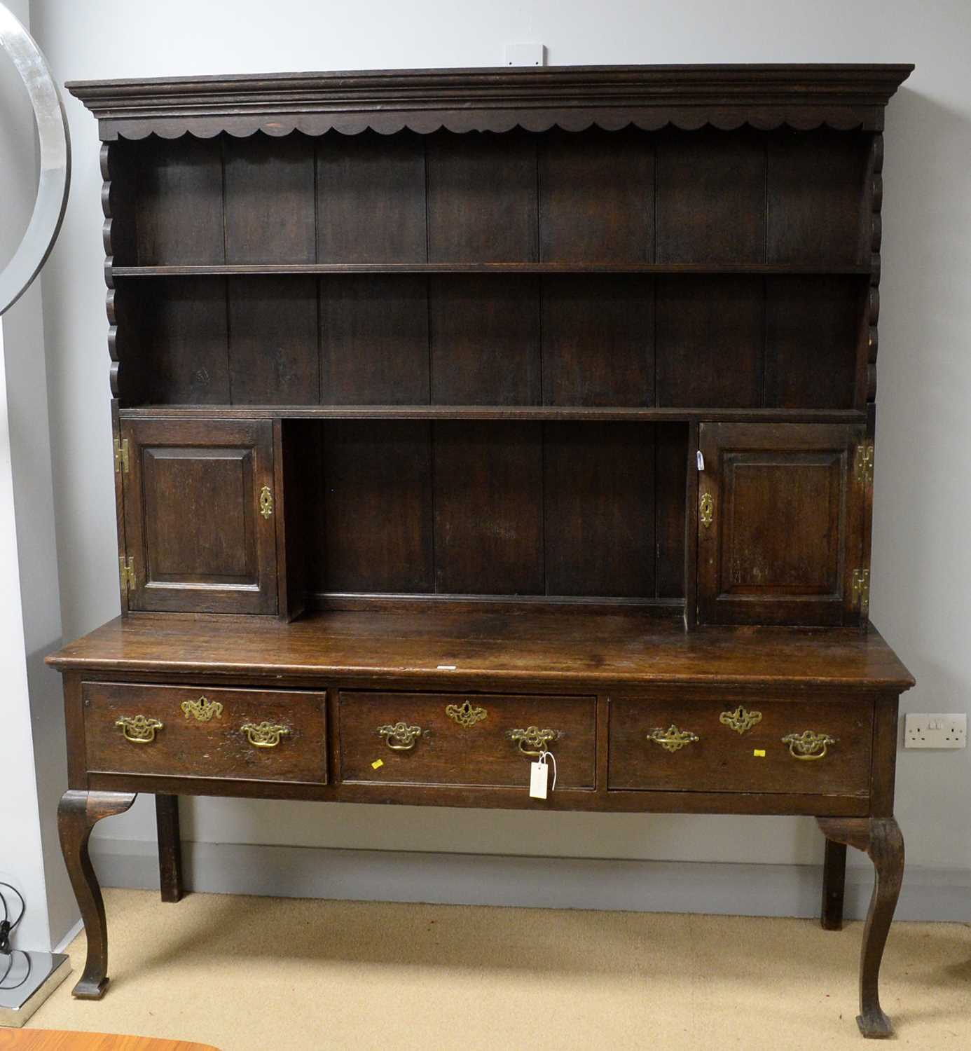 Lot 98 - A 19th Century oak dresser.