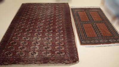 Lot 68A - A Turkmen carpet and a rug.