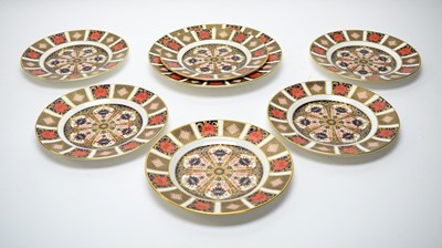 Lot 405 - A set of six Royal Crown Derby ‘Imari’ circular plates