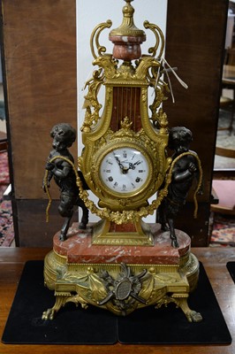Lot 81 - An French style cast, brass, bronzed and marble three-piece clock garniture by Lancini.