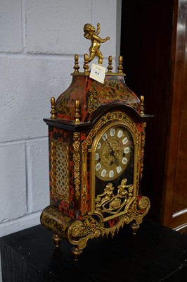 Lot 83 - A Continental Louis XIV-style inlaid bracket clock. with Hermle movement.