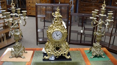 Lot 82 - An ornate continental cast brass and Sevres style three-piece clock garniture by Lancini.