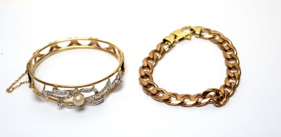 Lot 190 - A 9ct yellow gold curb link bracelet, and a bangle