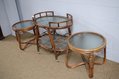 Lot 65 - Oval bamboo two-tier trolley; and a pair of circular occasional tables.