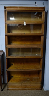 Lot 84 - Inglesants: an early 20th Century six-section oak bookcase.