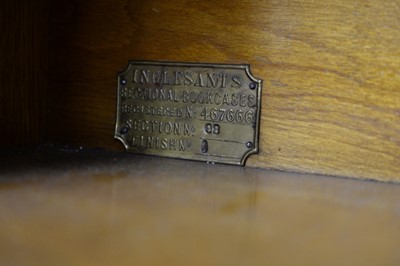 Lot 84 - Inglesants: an early 20th Century six-section oak bookcase.