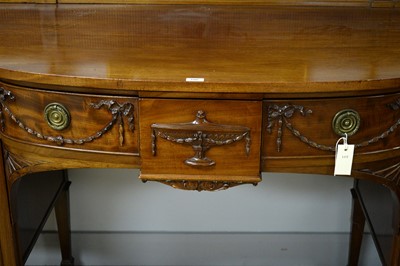 Lot 100 - Warings: an impressive fine quality Adam style mahogany bowfront sideboard.