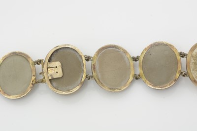 Lot 493 - A 19th Century Italian lava cameo and gold bracelet