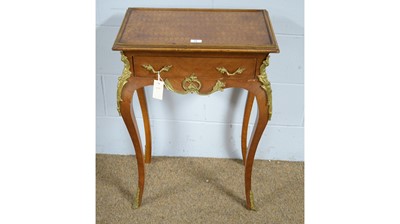 Lot 18 - A Louis XV style parquetry and gilt-metal mounted side table.