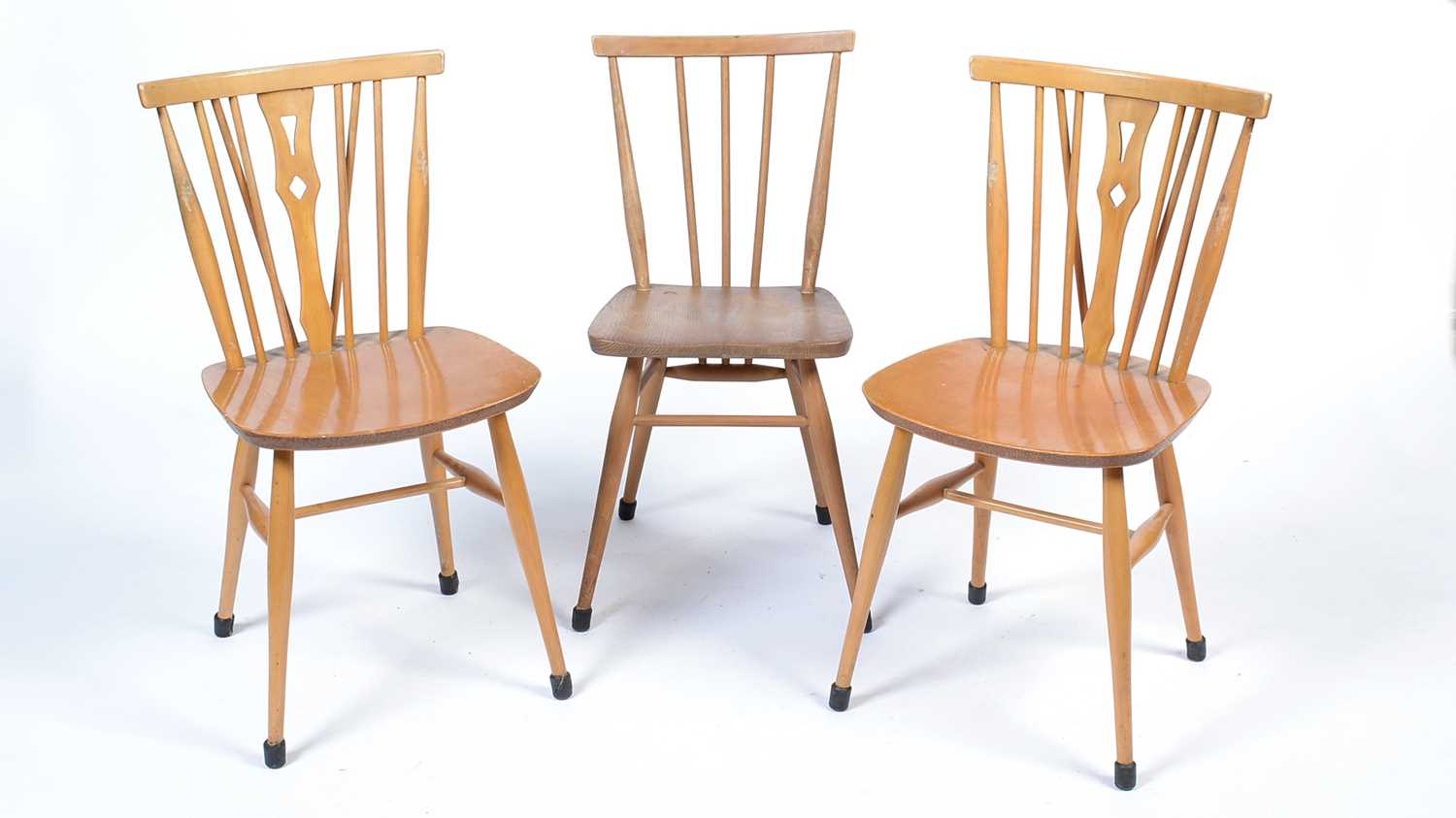 Lot 14 - An Ercol 391 'All-Purpose' Windsor chair; and two dining chairs.