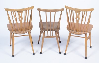 Lot 14 - An Ercol 391 'All-Purpose' Windsor chair; and two dining chairs.