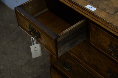 Lot 55 - A small 18th Century style burr walnut chest.
