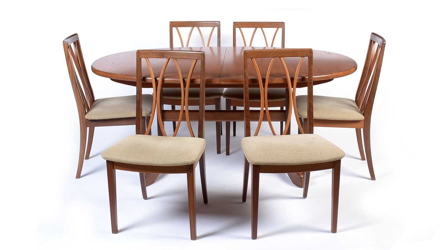 Lot 33 - G-Plan: teak oval extending dining table; and six chairs.
