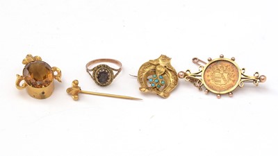 Lot 133 - An amethyst ring, and three gold brooches.