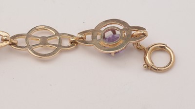 Lot 136 - A 9ct yellow gold and amethyst bracelet