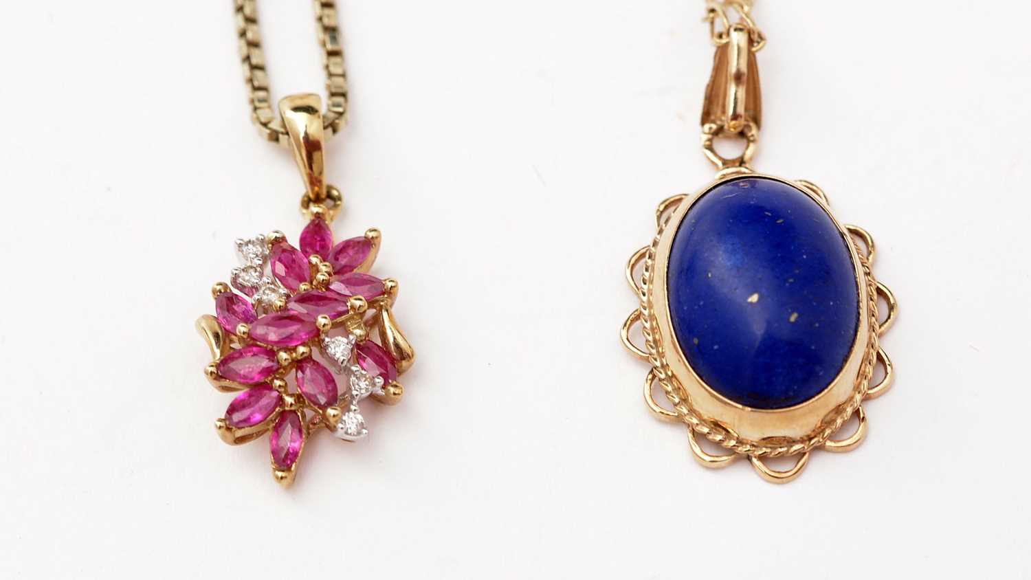 Lot 147 - A ruby and diamond pendant and another.