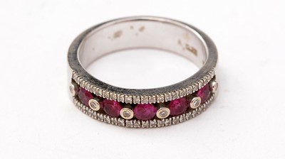 Lot 158 - A ruby and diamond ring