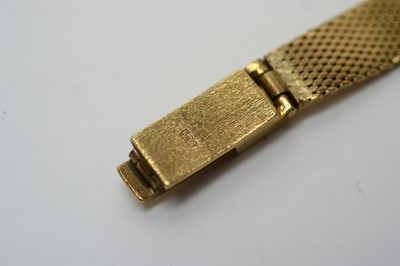 Lot 182 - A Tissot 9ct yellow gold cocktail watch