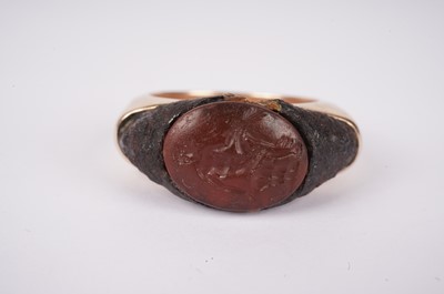 Lot 1169 - A Roman carnelian intaglio ring