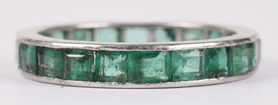Lot 1172 - An emerald eternity ring and a sapphire eternity ring