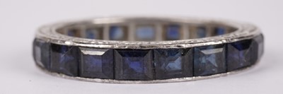Lot 1172 - An emerald eternity ring and a sapphire eternity ring