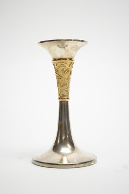 Lot 108 - A pair of silver and silver gilt candlesticks, by Nicholas Plummer, and a stopper