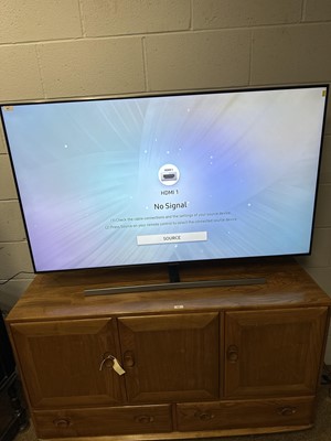 Lot 41 - A Samsung 55in. television with remote control.