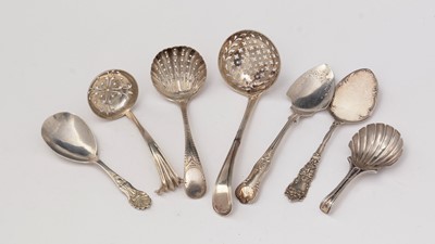 Lot 190 - Silver sugar sifters, tartlet slices and caddy spoons