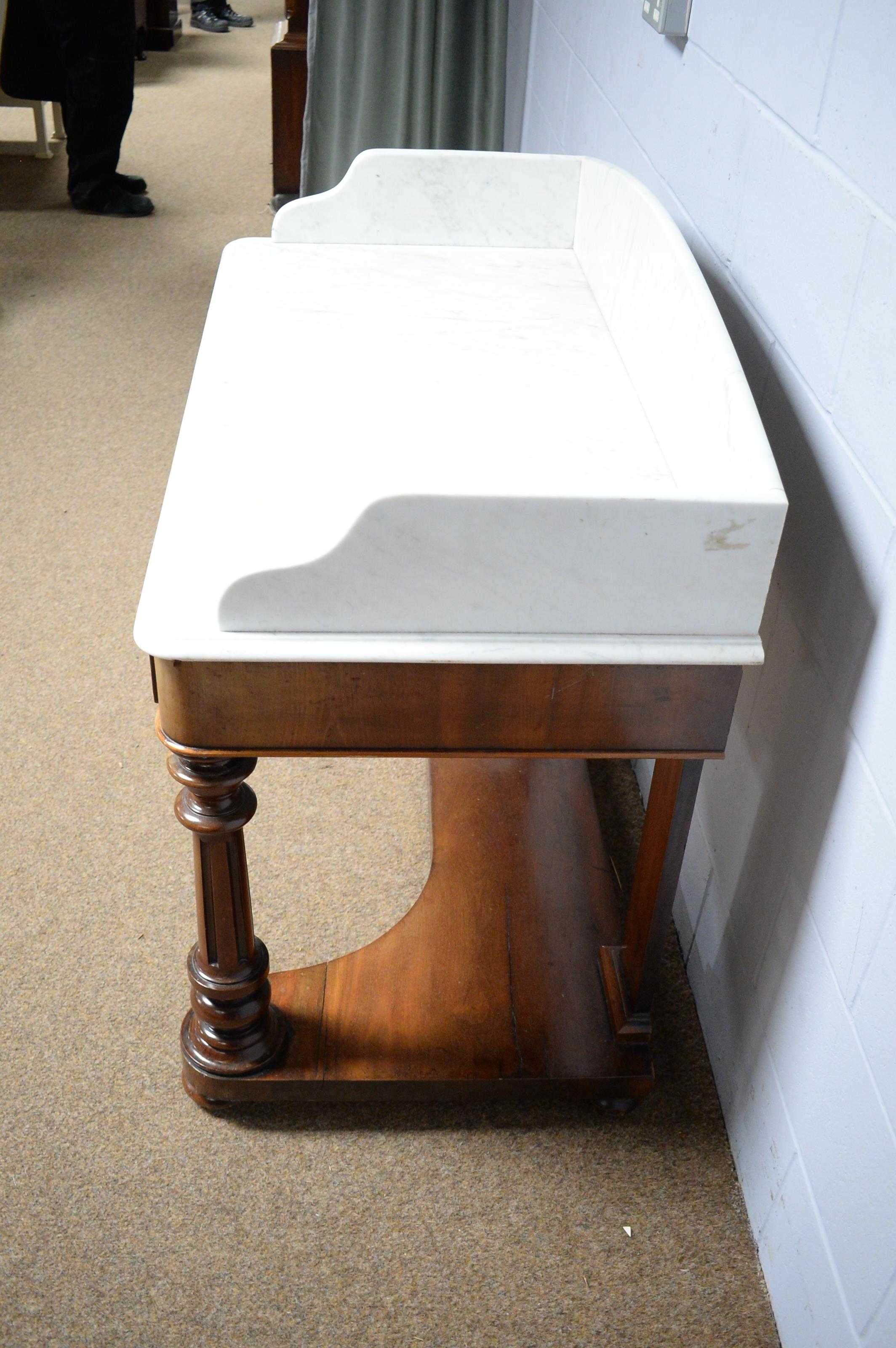 Lot 62 A Victorian mahogany marble top washstand.