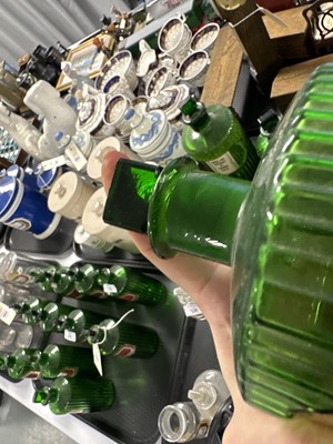 Lot 301 - A collection of green glass apothecary bottles.