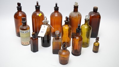 Lot 297 - A selection of brown glass apothecary bottles.