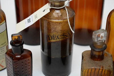 Lot 297 - A selection of brown glass apothecary bottles.