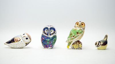 Lot 401 - A collection of three Royal Crown Derby ceramic owl paperweights.