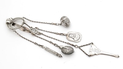 Lot 385 - A Victorian silver and parcel-gilt chatelaine clip with five chains.