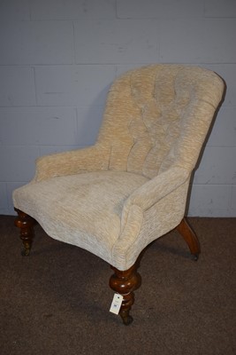 Lot 39 - A Victorian button-back armchair.