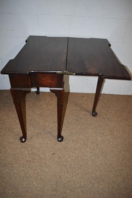 Lot 31 - An 18th Century mahogany tea table.