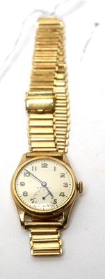 Lot 118 - A gold wristwatch by Zenith and two other watches.