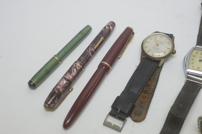 Lot 124 - A selection of wristwatches; and three fountain pens