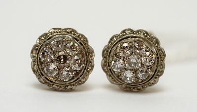 Lot 125 - A pair of diamond earrings