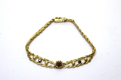 Lot 165 - A sapphire set 18ct yellow gold bracelet