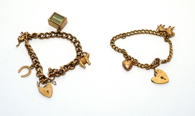 Lot 187 - Two 9ct yellow gold charm bracelets